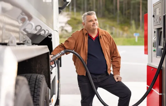 Man fueling his truck