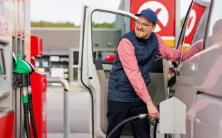 Man fueling his vehicle